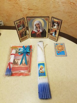 Святыни: икона Божией Матери "Умиление", иконочка Божией Матери Почаевской, свечи и ладан из Иерусалима