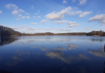 В момент освящения воды.